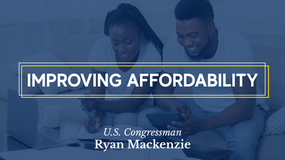 Couple looking at a laptop and calculator. Caption: Improving Affordability