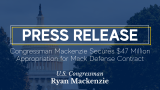 Capitol with overlay. Caption: Congressman Mackenzie Secures $47 Million Appropriation for Mack Defense Contract